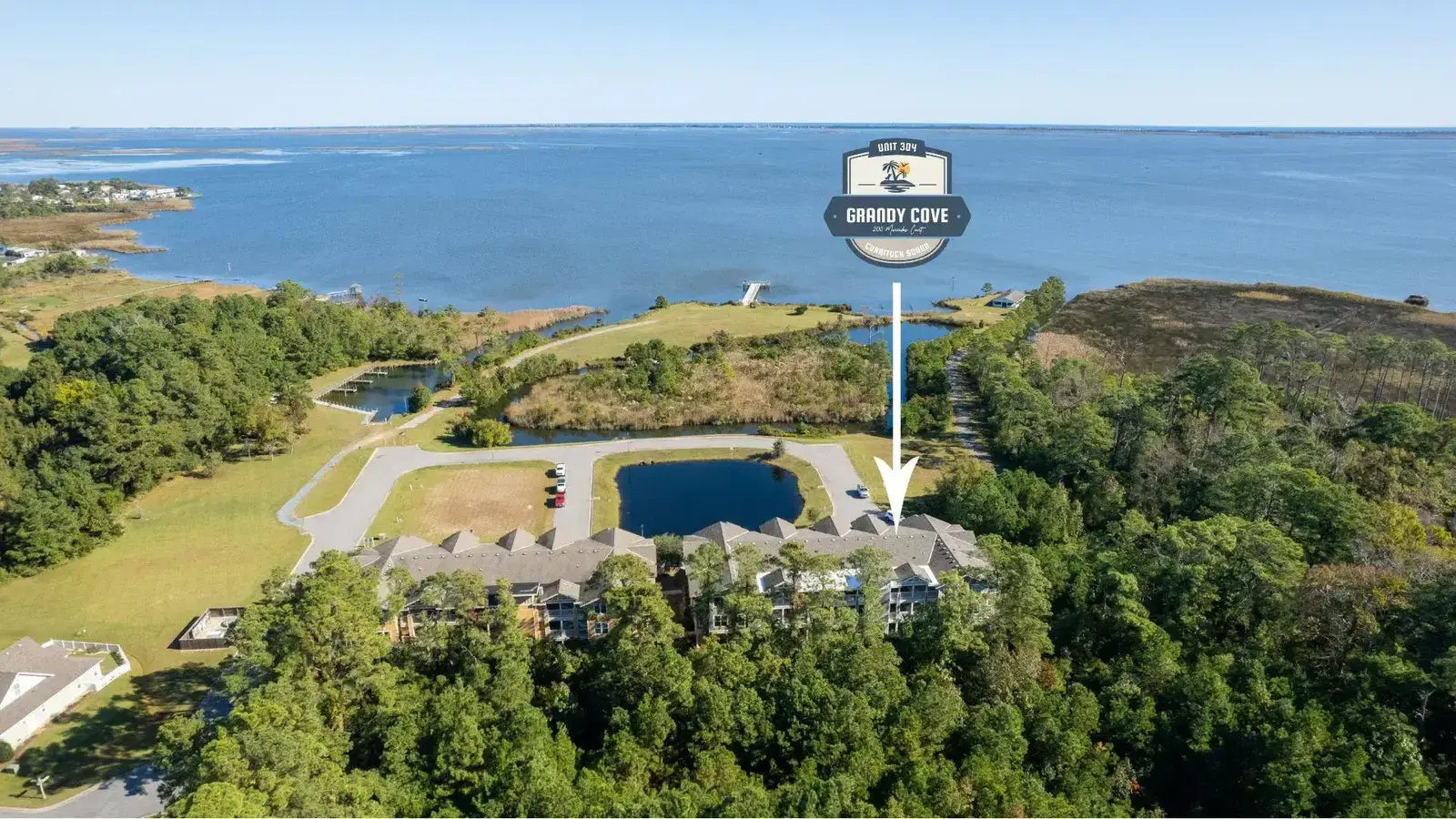 Grandy Cove waterfront vacation rental — aerial view of the property and Currituck Sound