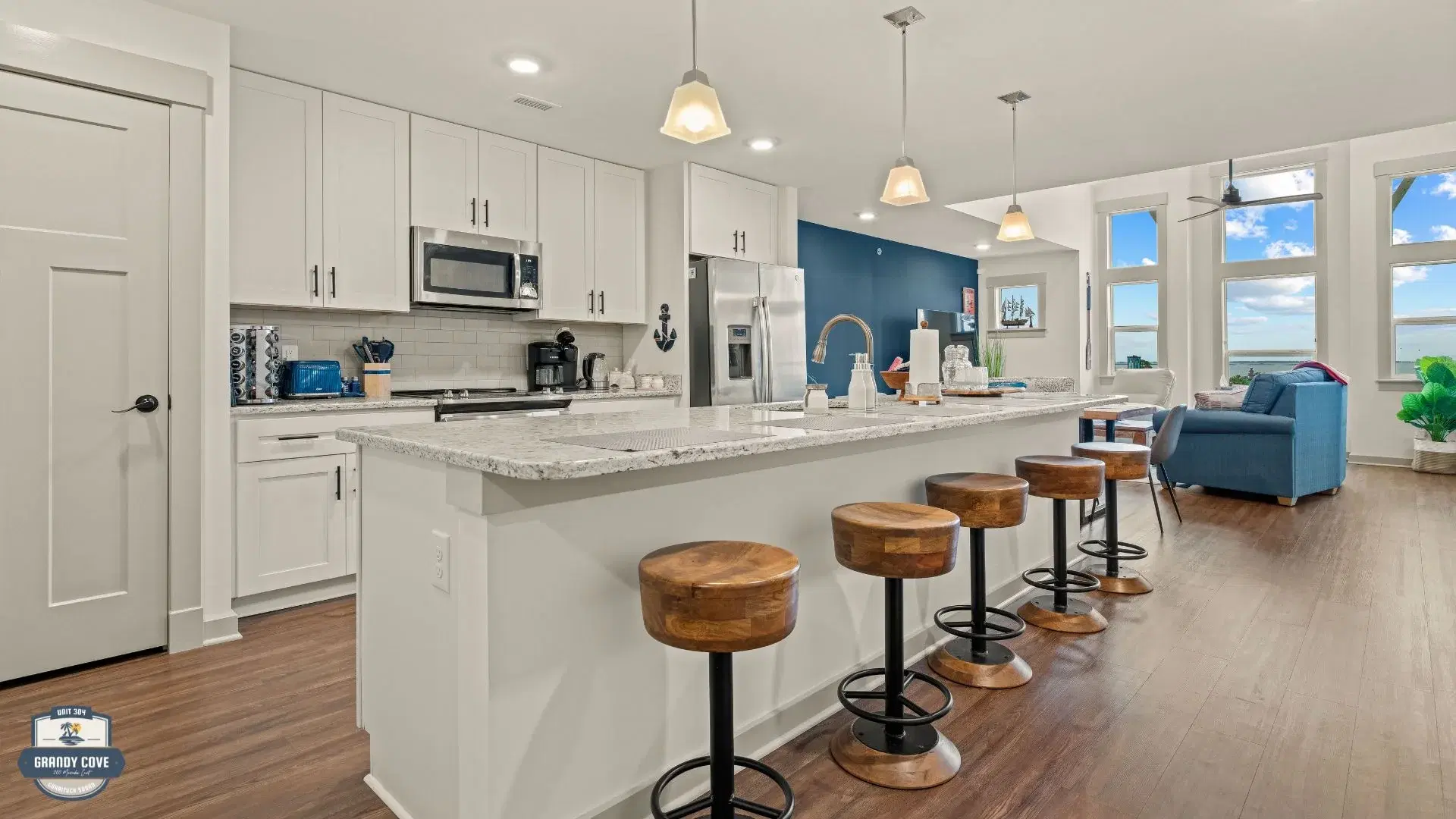Grandy Cove open-concept kitchen with island and bar seating