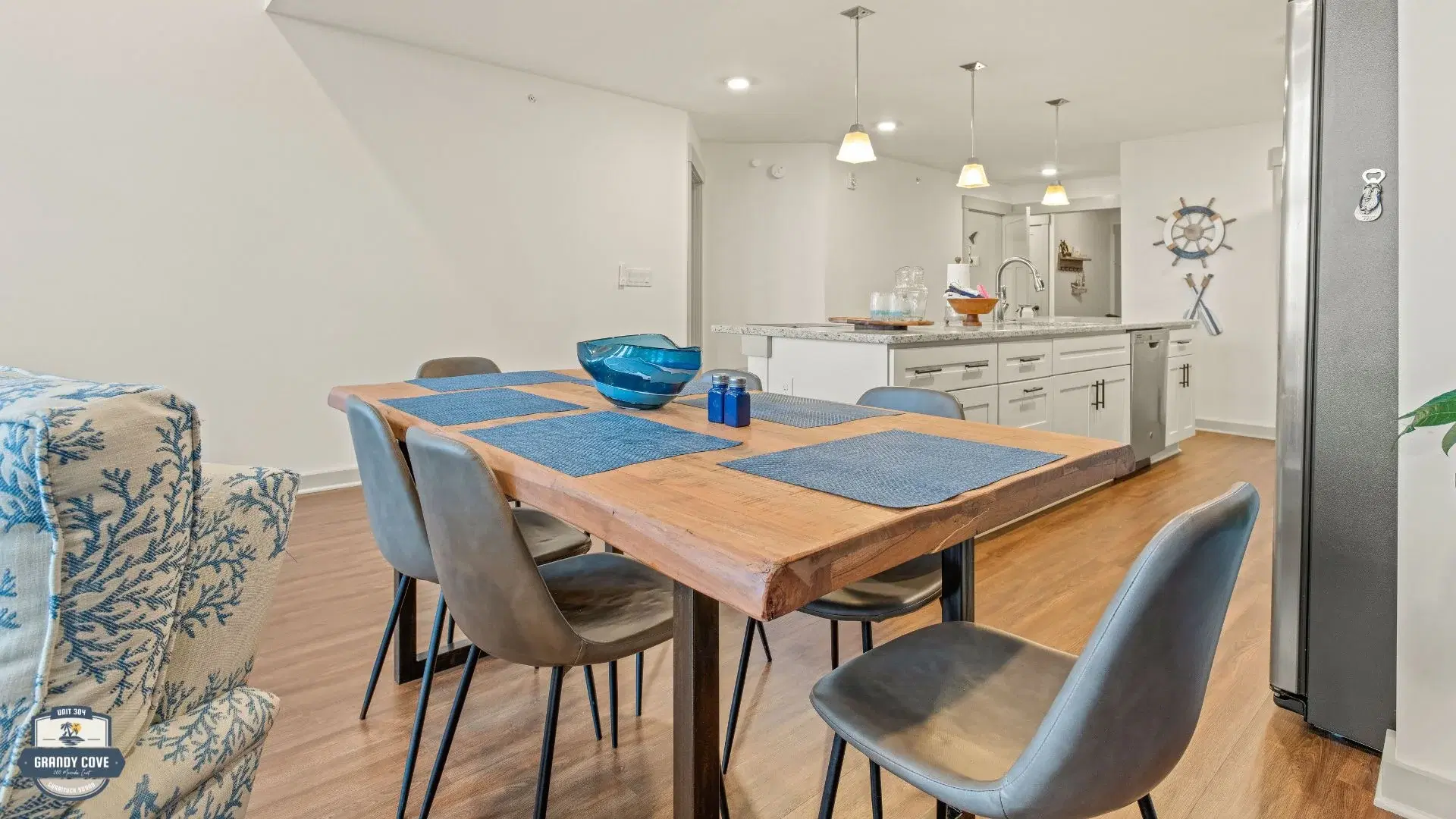 Grandy Cove dining table with six chairs and open-plan layout